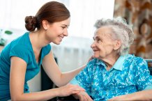 Elderly woman carer right hand